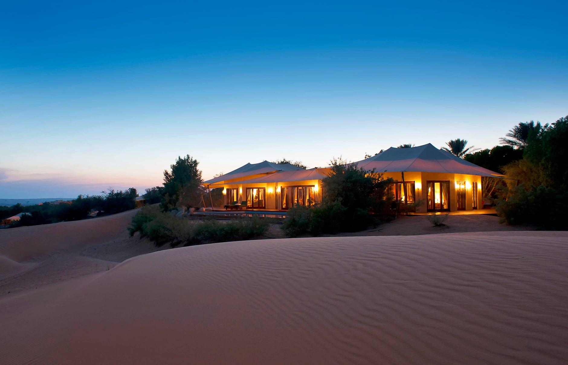 Al Maha Desert Resort — private pool suite and dune landscape, Dubai Desert Conservation Reserve