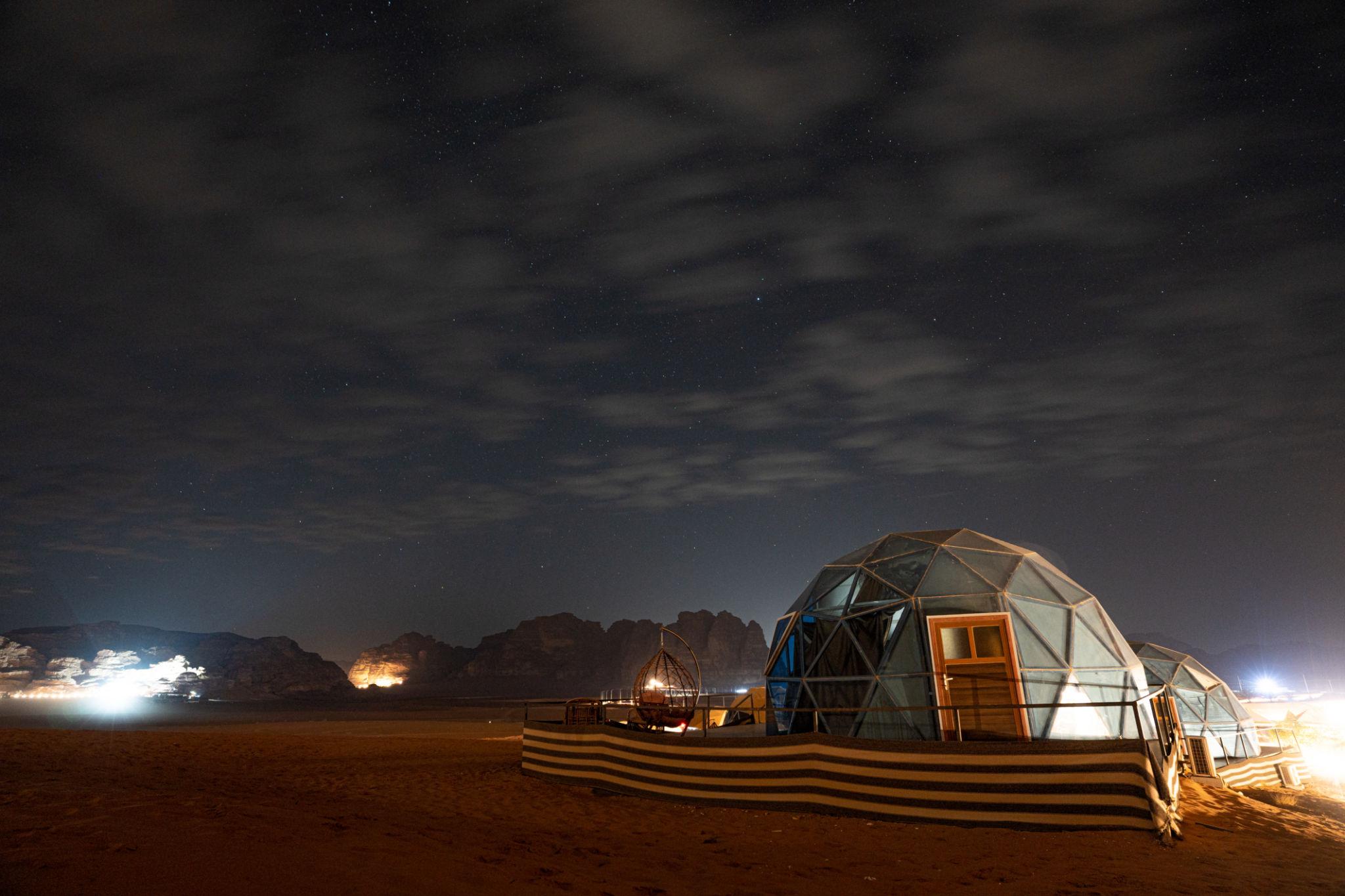 Wadi Rum Night Luxury Camp — desert camp at dusk, Wadi Rum Jordan